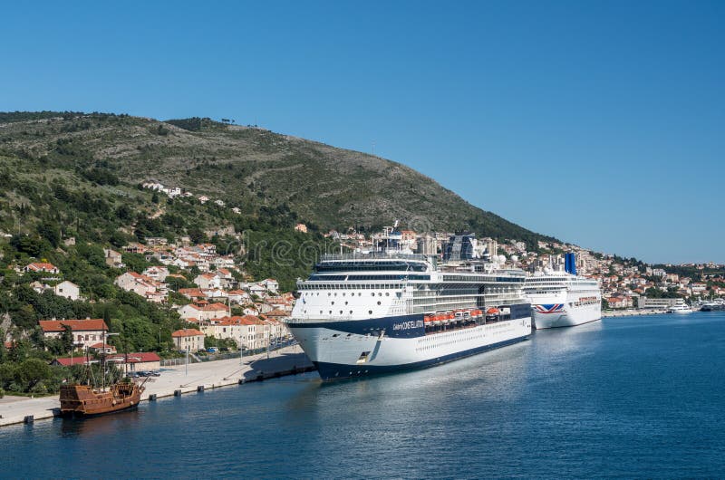 Dubrovnik, Croatia - 22 May 2019: Celebrity Constellation cruise ship with P and O Oriana docked in the Dubrovnik cruise. Dubrovnik, Croatia - 22 May 2019: Celebrity Constellation cruise ship with P and O Oriana docked in the Dubrovnik cruise