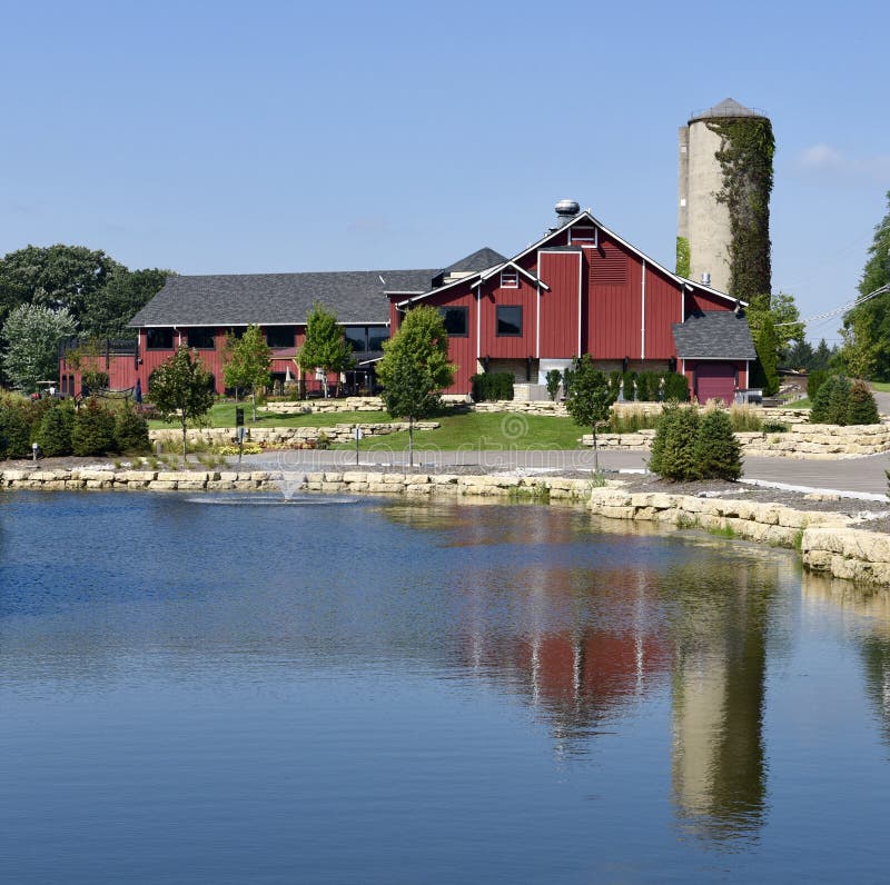 This is a Summer picture of the iconic Barn at the Fishermen`s Inn located at Elburn, Illinois in Kane County. This structure built in 1986 replaced the original barn built in 1898 but burned down in 1985. The original silo survives. This picture was taken on August 31, 2017. This is a Summer picture of the iconic Barn at the Fishermen`s Inn located at Elburn, Illinois in Kane County. This structure built in 1986 replaced the original barn built in 1898 but burned down in 1985. The original silo survives. This picture was taken on August 31, 2017.