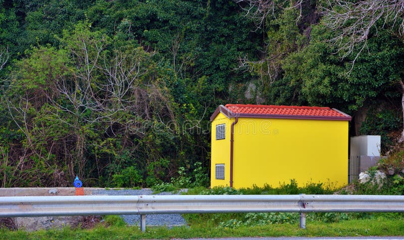 Yellow roadman`s house between celle ligure and Albissola Italy. Yellow roadman`s house between celle ligure and Albissola Italy