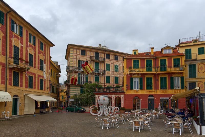 Celle Ligure, Italy - 3 january 2022: Central square of the town in a cloudy day. High quality photo. Celle Ligure, Italy - 3 january 2022: Central square of the town in a cloudy day. High quality photo