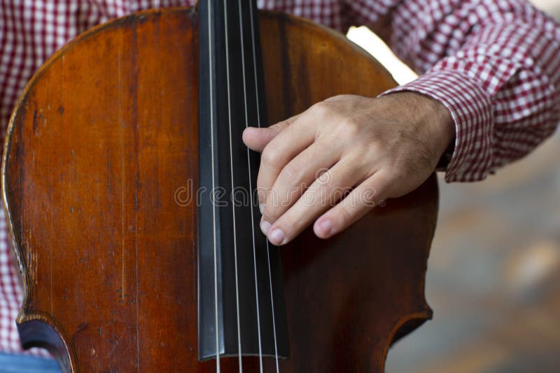 Close Up of Cello with Bow in Hands Stock Photo Image of musician