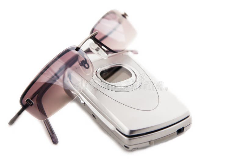 Cellular Phone and Sunglasses royalty free stock photo Cellular Phone and Sunglasses royalty free stock photo