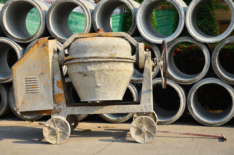 A concrete mixer (also commonly called a cement mixer) is a device that homogeneously combines cement, aggregate such as sand or gravel, and water to form concrete. A typical concrete mixer uses a revolving drum to mix the components. For smaller volume works portable concrete mixers are often used so that the concrete can be made at the construction site, giving the workers ample time to use the concrete before it hardens. An alternative to a machine is mixing concrete by hand. This is usually done in a wheelbarrow; however, several companies have recently begun to sell modified tarps for this purpose. For smaller jobs, such as residential repairs, renovations, or hobbyist-scale projects, many cubic yards of concrete are usually not required. Bagged cement is readily available in small-batch sizes, and aggregate and water are easily obtained in small quantities for the small work site. To service this small-batch concrete market, there are many types of small portable concrete mixers available A typical portable concrete mixer uses a small revolving drum to mix the components. For smaller jobs the concrete made at the construction site has no time lost in transport, giving the workers ample time to use the concrete before it hardens. Portable concrete mixers may be powered by a gasoline engine, although it is more common that they are powered by electric motors using standard mains current. Metal steel drum stock images, royalty-free photos and pictures