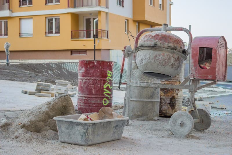 Cement Mixer With Barrel And Plastic Cement Mixing Trough Stock Image