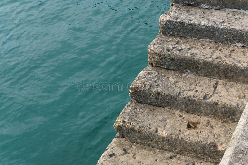 Cement steps on the edge of a quay