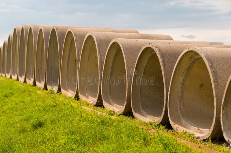 Cement Tubes stock image. Image of construction, warehouse 26263145