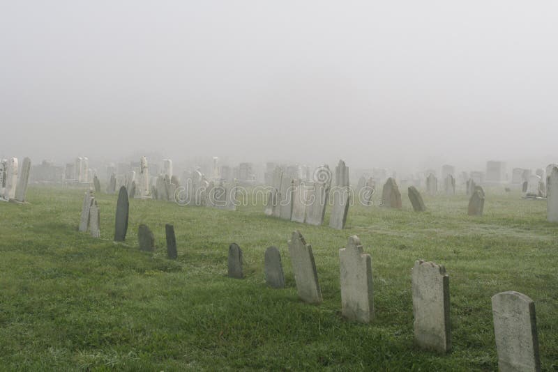Spooky old cemetery on a foggy morning. Spooky old cemetery on a foggy morning