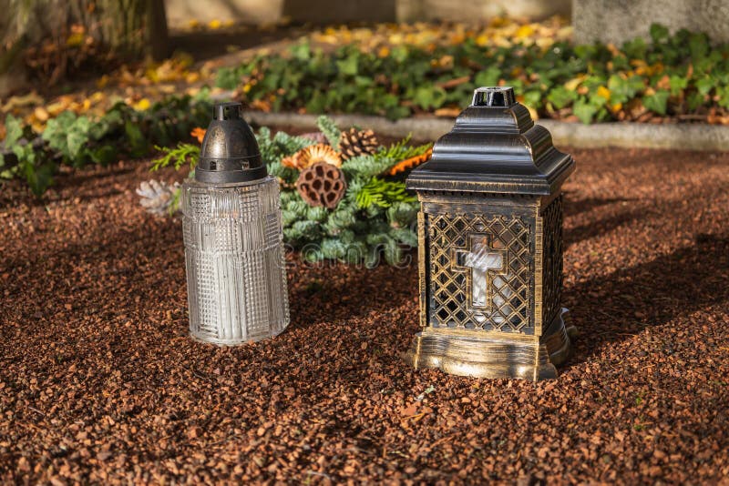 A Cemetery and a Grave with Candles on it Stock Photo Image of