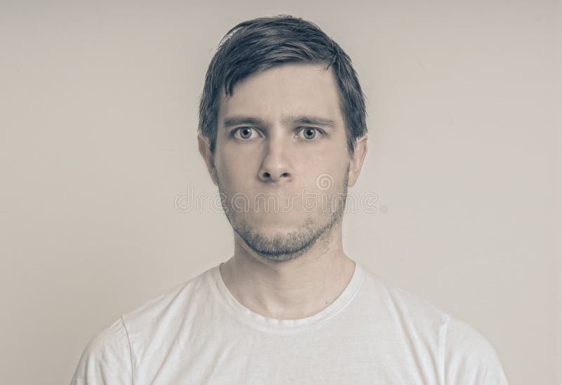 Censorship concept. Face of young man without mouth