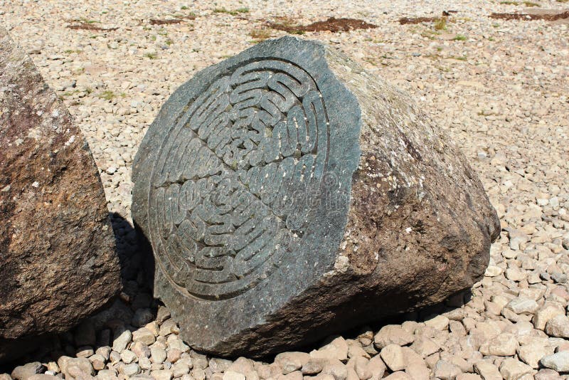 Centenary Stone, Derwent Water, (National Trust). The Centenary Stone commemorates the 100th birthday of the National Trust. It is on the shore of Derwent Water stock photos Centenary Stone, Derwent Water, (National Trust). The Centenary Stone commemorates the 100th birthday of the National Trust. It is on the shore of Derwent Water stock photos