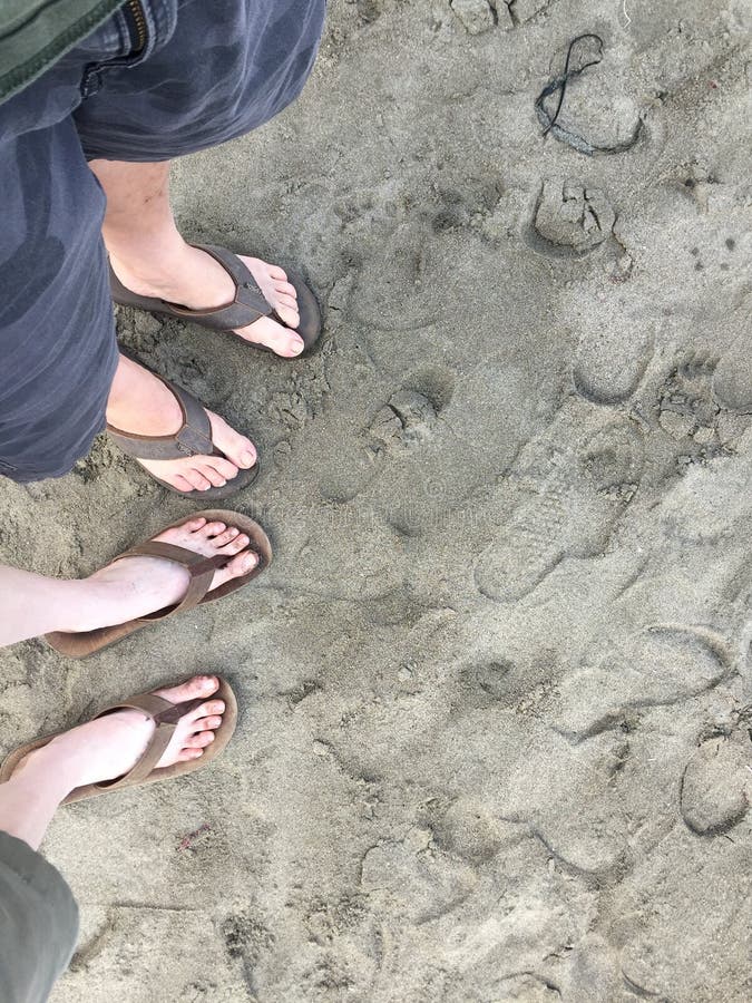 Happy Couple with Pale Skin in Flip Flops at San Simeon Point Beach ...