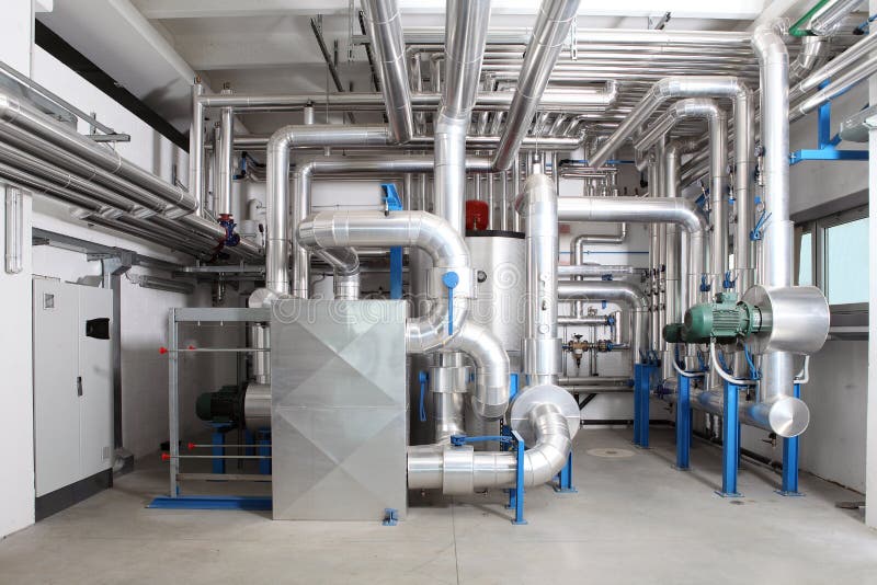 Central heating and cooling system control in a boiler room stock photos