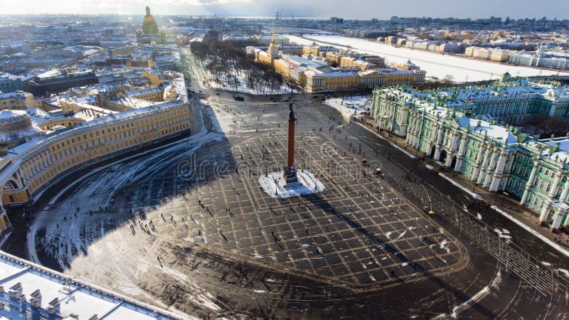 Central part of southern facade of Winter Palace, Alexander Column are on wintry Palace Square. St. Petersburg, Russia