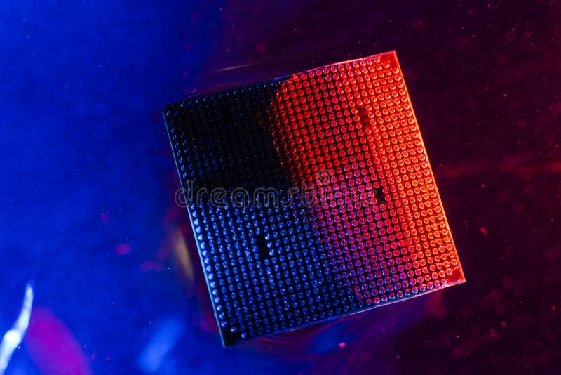 Central processor under water, cpu, blue and red light, under water. Technology of cyber-electronic concept. Technological backgro royalty free stock image