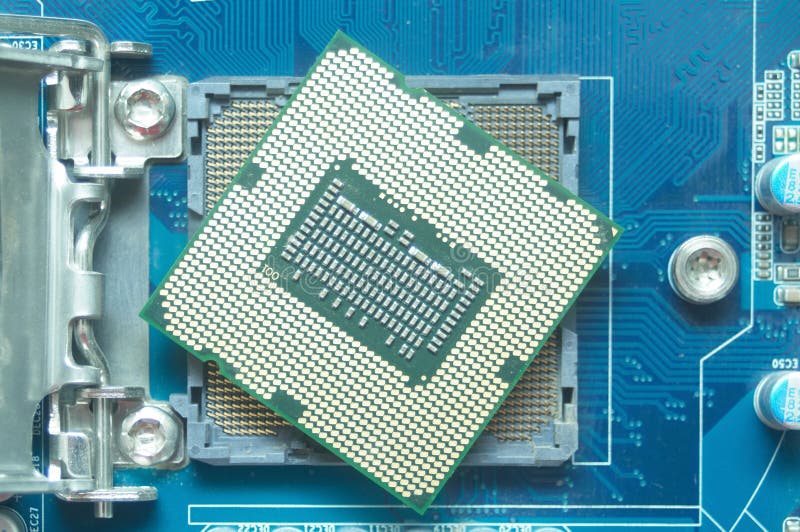 Central processor unit CPU and his socket on motherboard stock photography