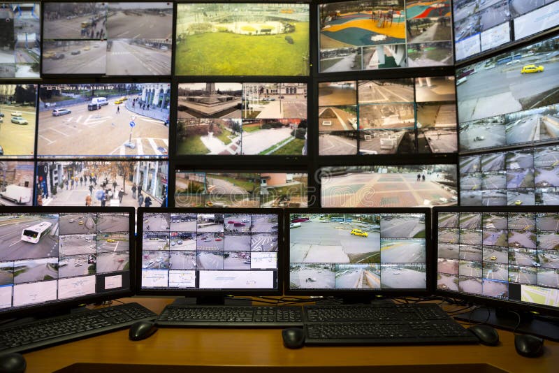 The control room of the city surveillance center. Computer monitors showing the cameras all over the city. The control room of the city surveillance center. Computer monitors showing the cameras all over the city.