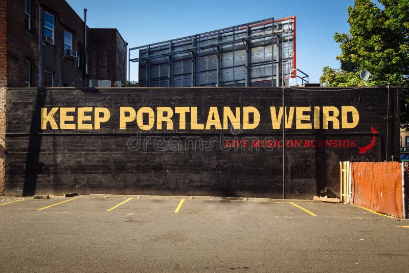 Downtown Portland, Oregon, USA - August 3, 2018: Keep Portland Weird Street Lettering Sign to promote local business. The slogan has been called the unofficial motto of Portland. Downtown Portland, Oregon, USA - August 3, 2018: Keep Portland Weird Street Lettering Sign to promote local business. The slogan has been called the unofficial motto of Portland