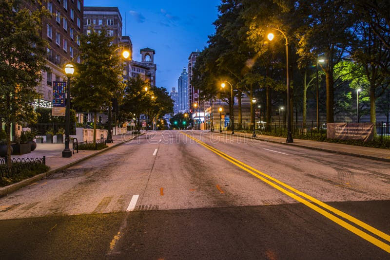 Atlanta, Ga USA - 06 14 20: Downtown Atlanta at night empty city street during the covid-19 lock down. Atlanta, Ga USA - 06 14 20: Downtown Atlanta at night empty city street during the covid-19 lock down