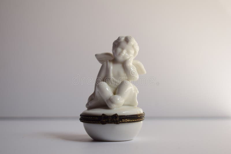 Ceramic cherub angel box stock photo. Image of monument 273398482