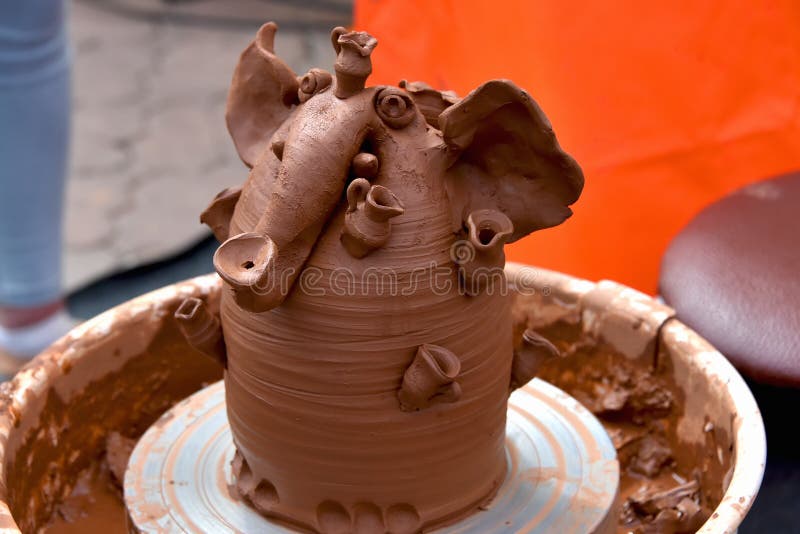 Ceramic Clay Figurine of an Elephant in a Pottery Stock Photo