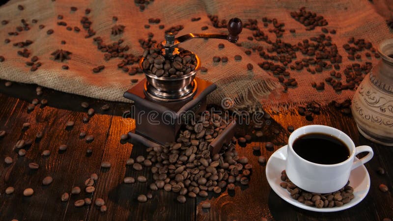 Ceramic coffee maker on table with cup of black coffee stock footage