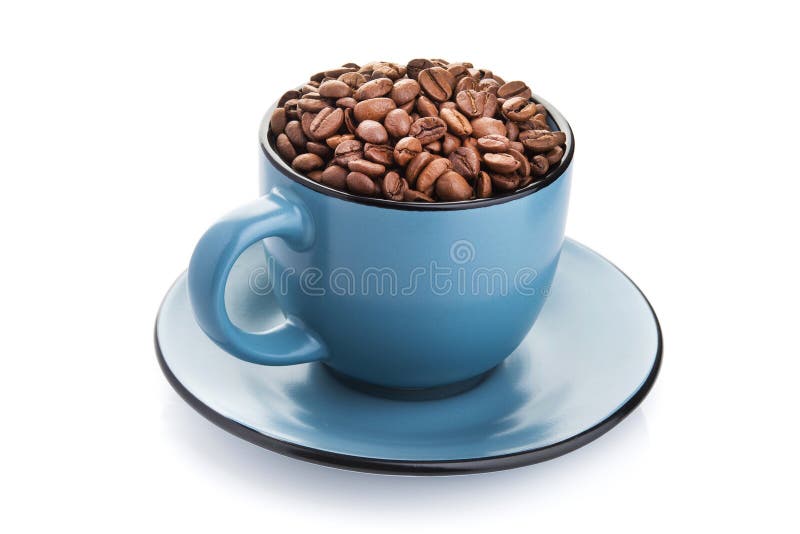 ceramic cup filled with roasted coffee beans