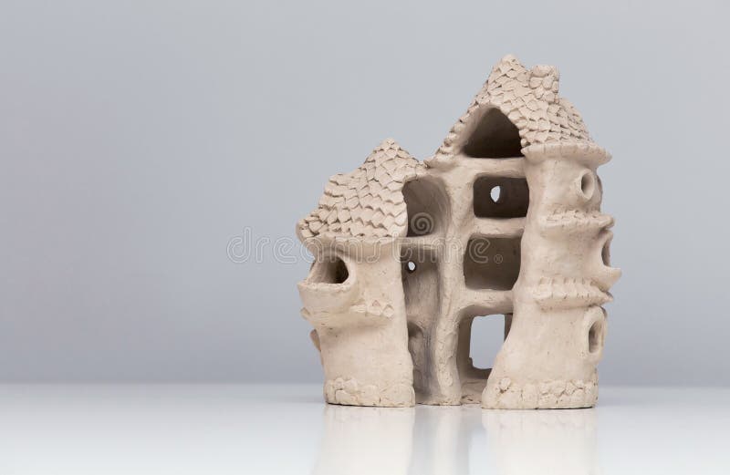 Ceramic doll house made of clay.