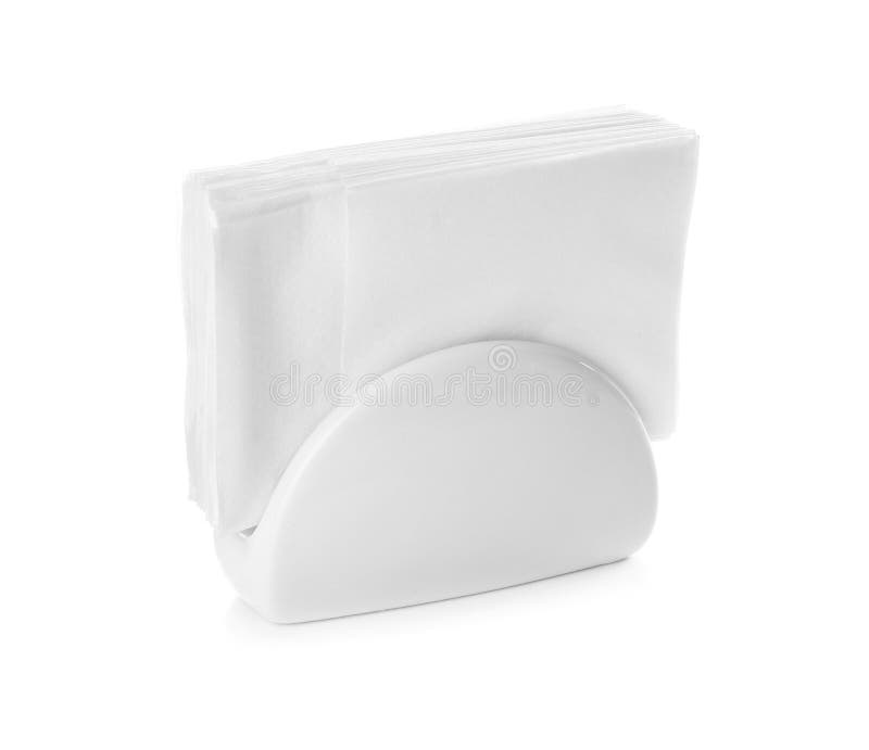 Ceramic napkin holder with paper serviettes