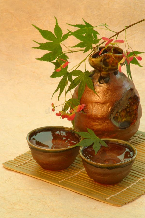 Ceramic sake bottle and cups.