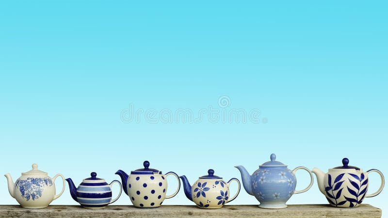 Ceramic teapot with blue pastel wall background.