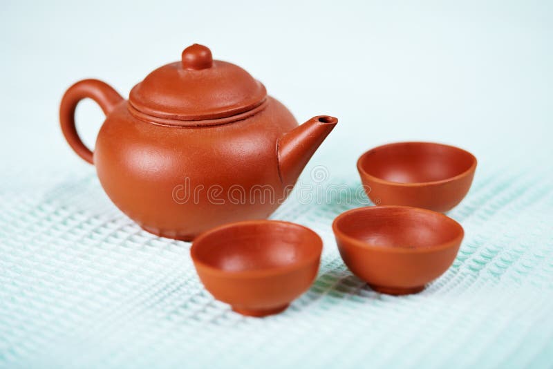 Ceramic Teapot and Cups on Blue Towel Stock Photo Image of teapot