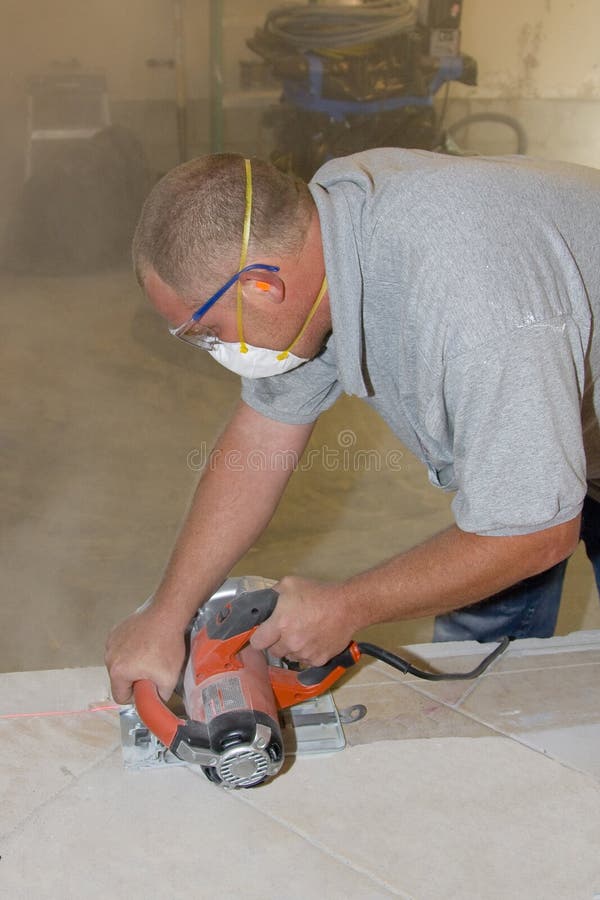 Ceramic tile installer stock photo. Image of ceramic, mastic 6284046