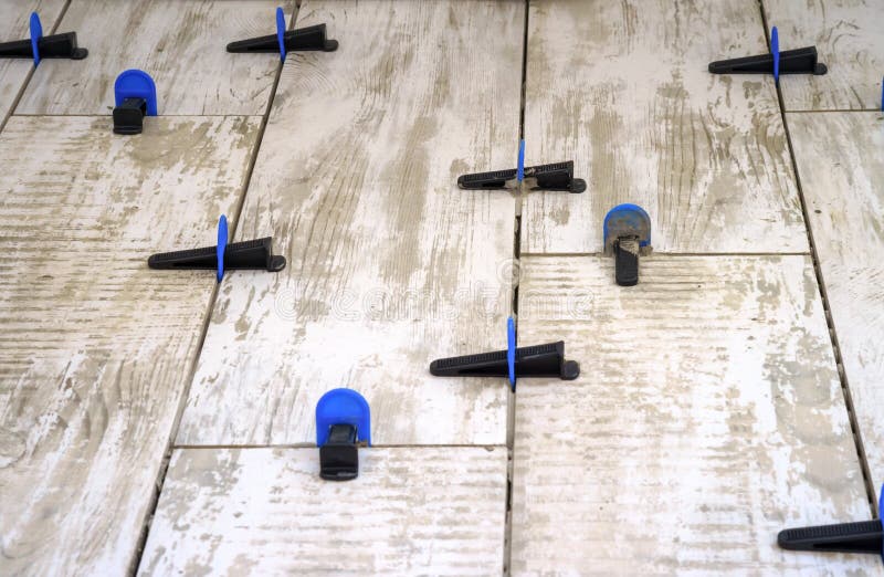 Ceramic Tile Leveling System. Apparatus for Laying Stoneware Tiles