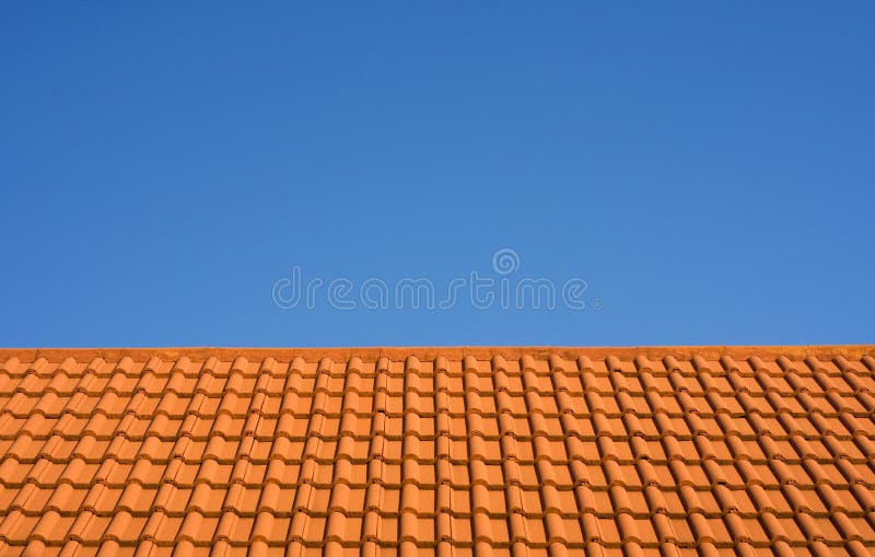Ceramic tile roof against a blue sky