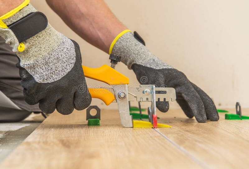Ceramic Tiles Leveling System Stock Image - Image of worker, tiles ...
