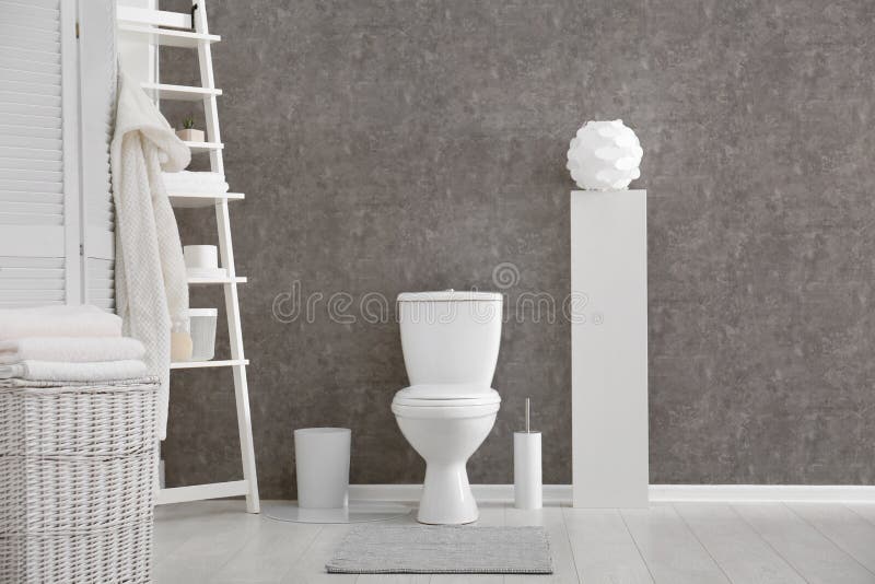 Ceramic Toilet Bowl in Stylish Bathroom. Idea for Interior Stock Photo
