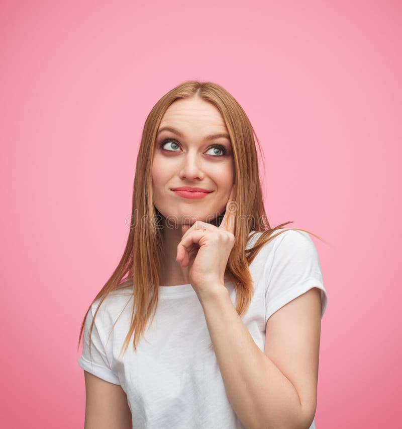 Cercare dubbioso della giovane donna immagine stock Cercare dubbioso della giovane donna immagine stock