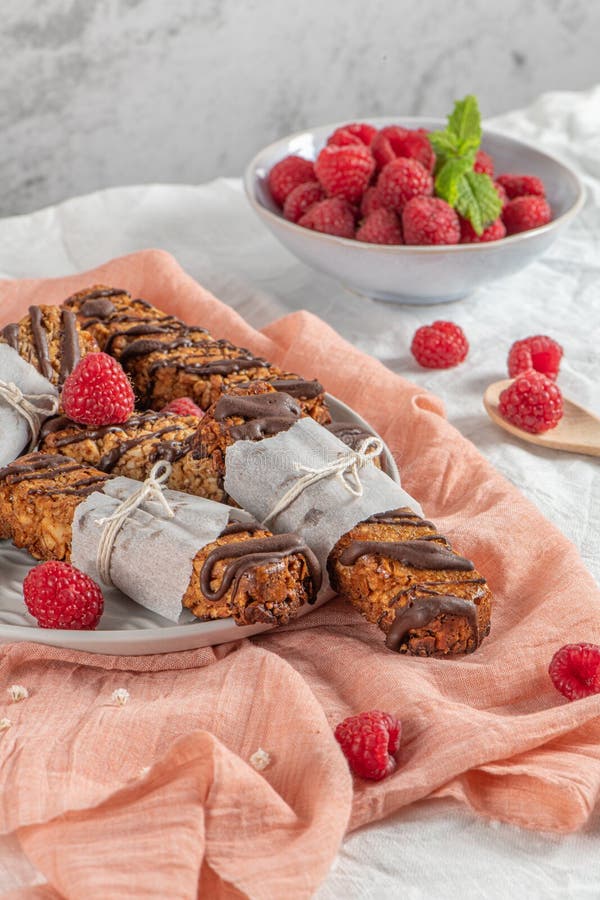 Cereal Bars with Raspberries on Kitchen Counter Top Stock Photo Image