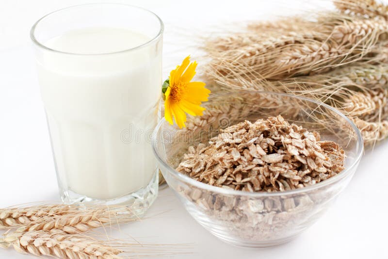 Cereal flakes and a glass of milk