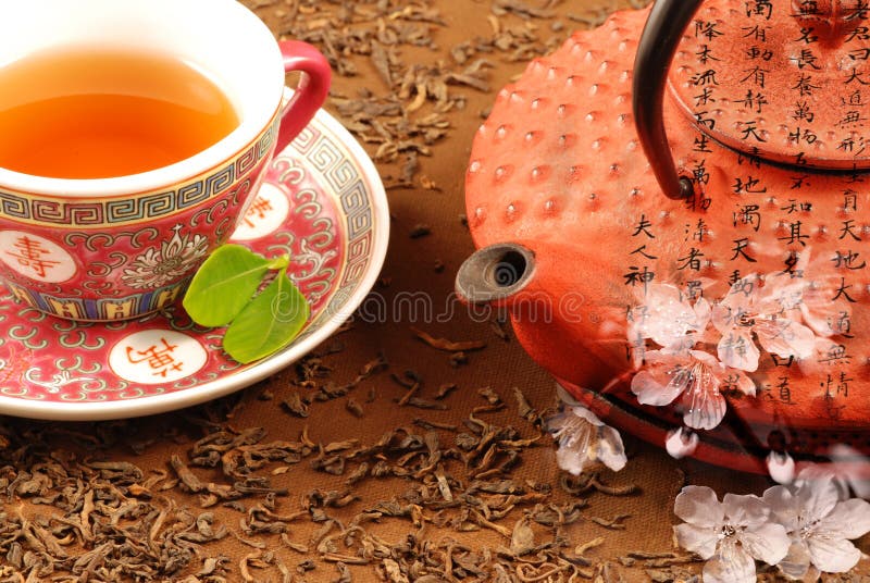 Special Chinese tea ceremony with kettle, calligraphy and cherry bloom. Special Chinese tea ceremony with kettle, calligraphy and cherry bloom