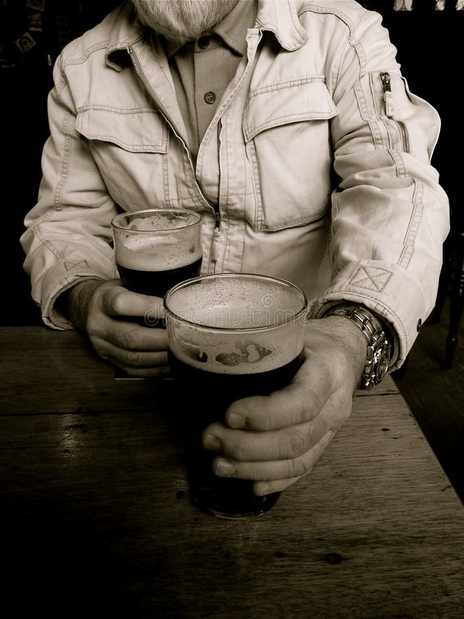 Man holding glass of beer. Man holding glass of beer