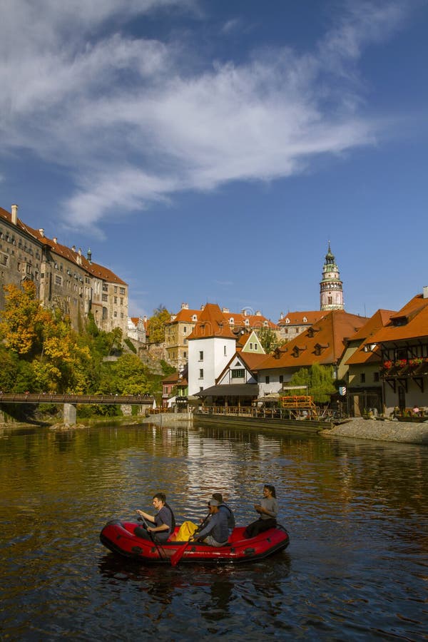 CESKY KRUMLOV , Czech Republic. On september 29 , 2019. Travelers are rafting in a canoe down the beautiful river Vltava. stock photography CESKY KRUMLOV , Czech Republic. On september 29 , 2019. Travelers are rafting in a canoe down the beautiful river Vltava. stock photography