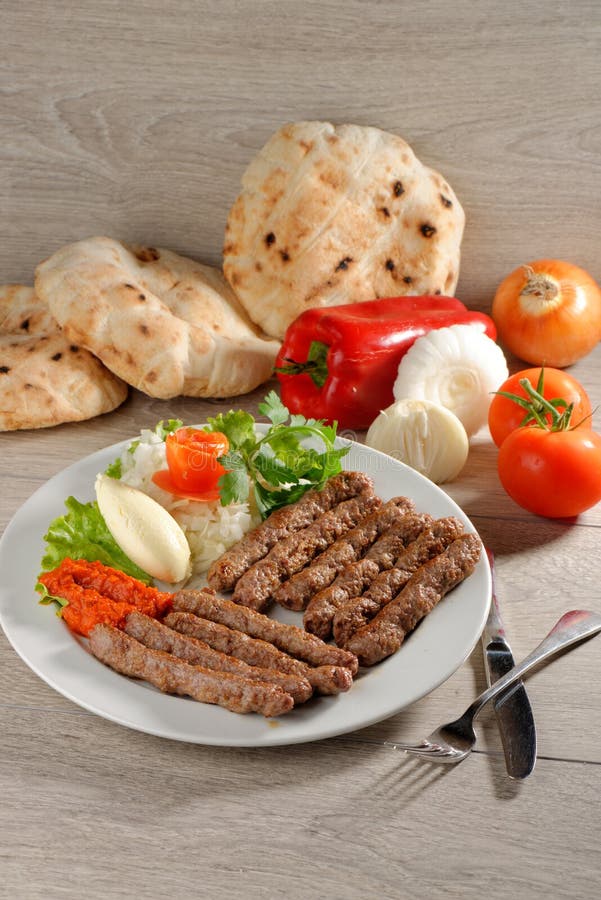 Cevapcici, a small skinless sausage cooked on the barbecue