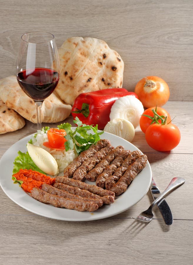 Cevapcici, a small skinless sausage cooked on the barbecue