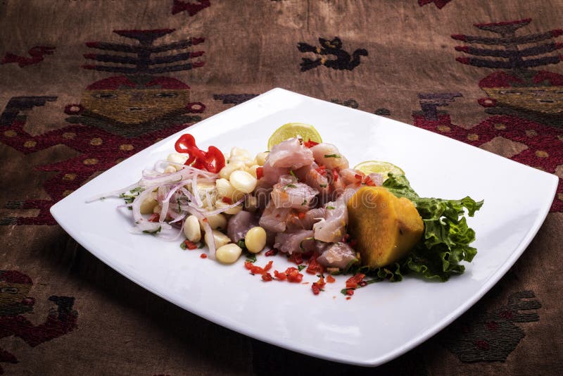 Ceviche Raw Fish Dish Sweet Potato Corn Grains Aji and Onion Symbol of Ceviche Raw Fish Dish Sweet Potato Corn Grains Aji and Onion Symbol of
