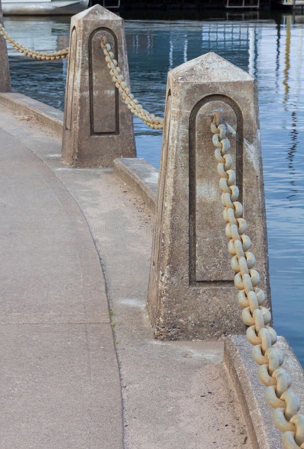 Chain and Cement Barrier stock photo. Image of river 27082610