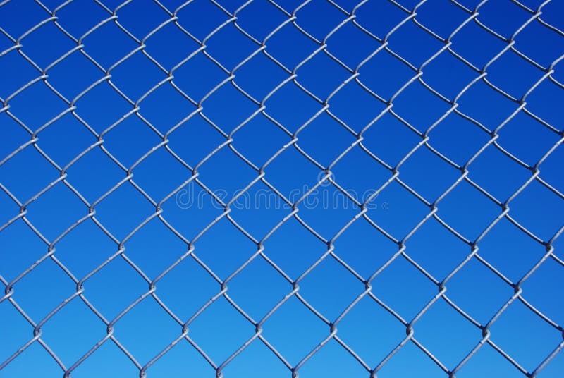 Chain Link Fence Against a Gradient Sky