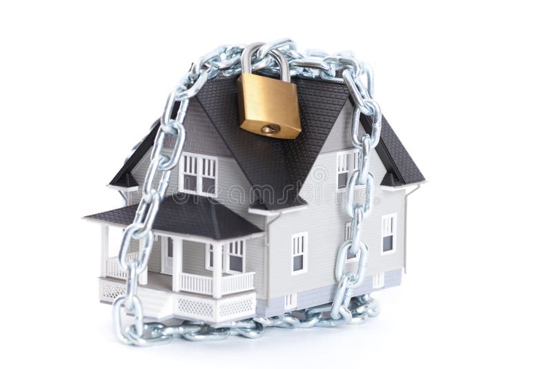 Chain with lock around the home royalty free stock photo