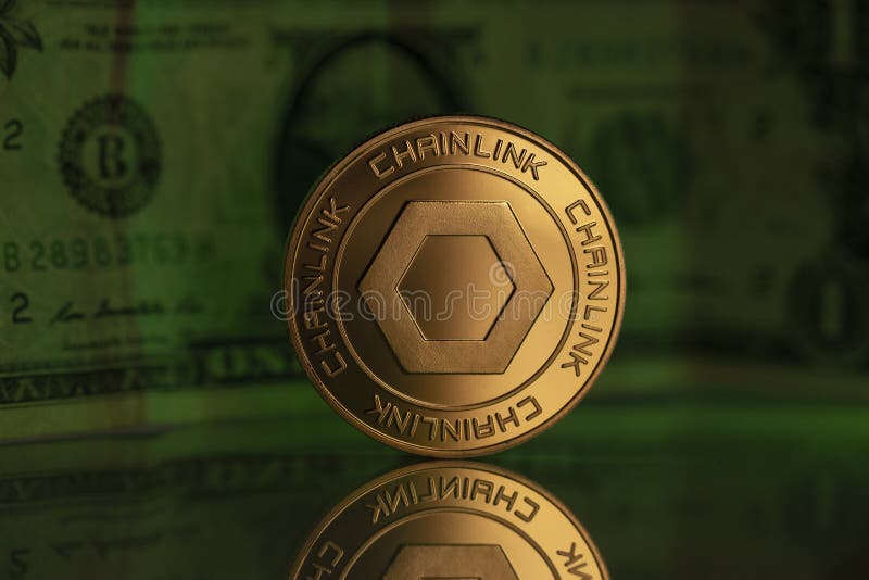 Chainlink LINK Crypto Coin Placed on Reflective Surface with One Dollar