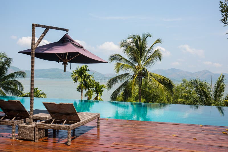 Chair Around Swimming Pool with Sea Background Stock Image Image of